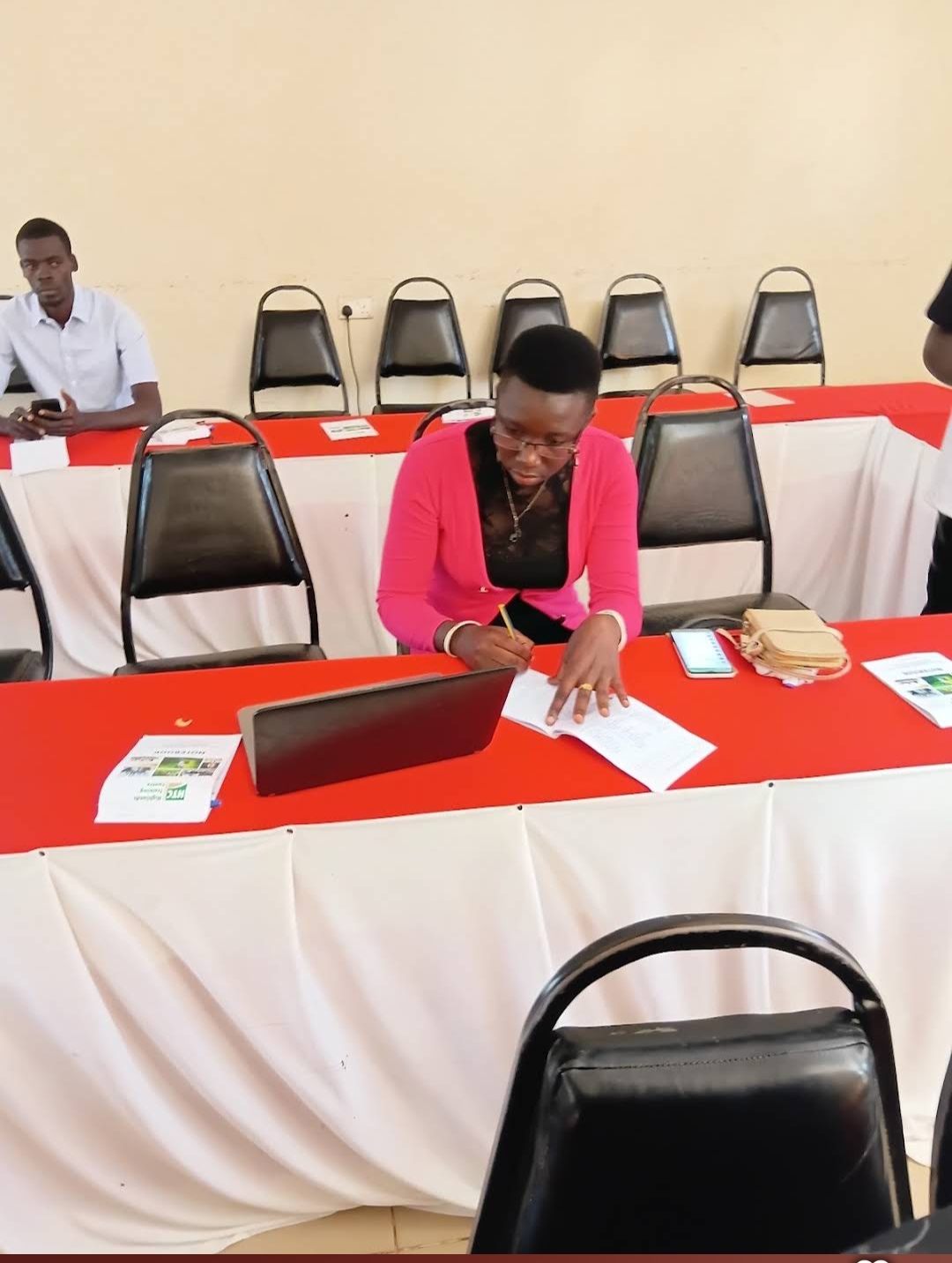 A delegate registering at a training