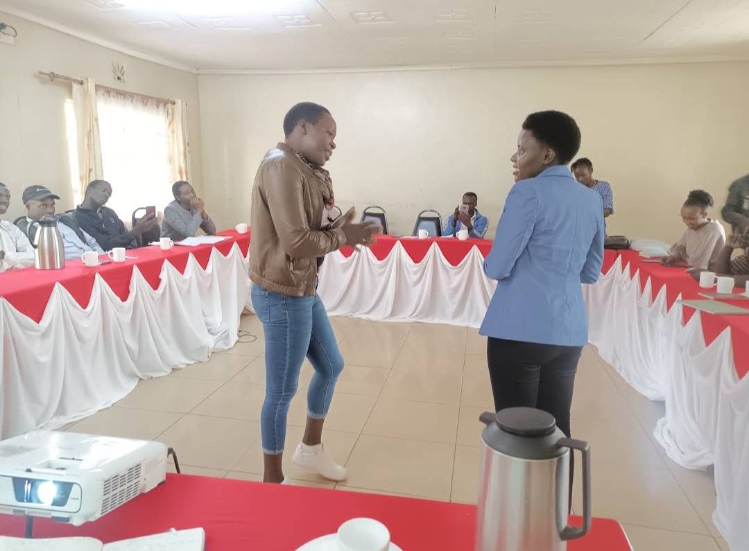 A facilitated role-play in a training hall